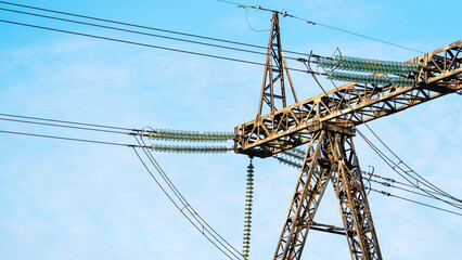 High-voltage power lines at dusk or dawn