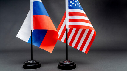 the Russian flag and the US flag on the table. Negotiation Concept