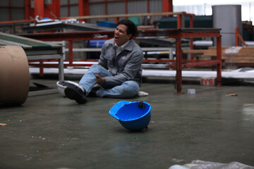 Accident at work of construction worker at site. Safety team helps employee accident.