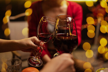 Party and celebration concept, Holidays summer, Group of friends clinking glasses wine on outdoor at night party.