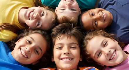 Obraz premium Group of Diverse Happy Children Lying in a Circle Smiling and Looking Up Together in a Bright Playroom or School Setting for Friendship and Childhood Joy