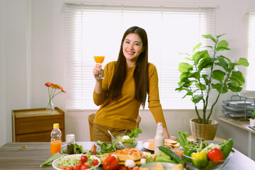 Happy young woman enjoying delicious homemade pizza at home.