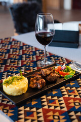 Gourmet Meal with Wine on Elegant Table Setting