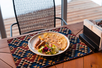Breakfast Plate with Omelette and Sausages