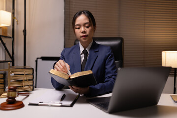 Female lawyer in office, Corporate lawyer at workspace, Attorney with legal books and gavel,