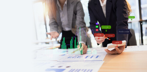 Team analyzing financial data and creating business strategies using digital tools.