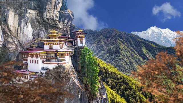 The amazing Tiger's Nest Monastery in Bhutan. Time Lapse. Taktshang Goemba or Tigers Nest Monastery in Paro. Time Lapse of the Tiger's Nest With Himalayan forest backdrop in Bhutan.  