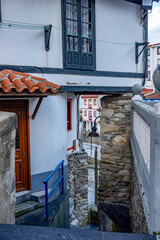Narrow Stone Stairs And Traditional Architecture In Cudillero Fishing Village Asturias Spain. White Houses, Steep Streets, Colorful, Coastal Village