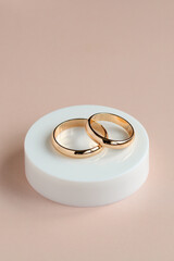 Gold wedding bands symbolizing love, commitment, and marriage