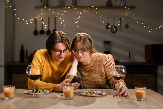 couple celebrating valentine day. romantic dinner - Powered by Adobe