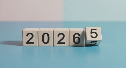 Wooden blocks spelling out 2026, with one block tilted
