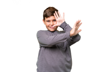 Little caucasian kid over isolated chroma key background nervous stretching hands to the front