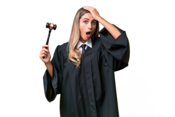 Judge Uruguayan woman over isolated background doing surprise gesture while looking to the side