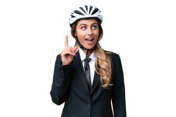 Business Uruguayan woman wearing a helmet biker over isolated background thinking an idea pointing the finger up