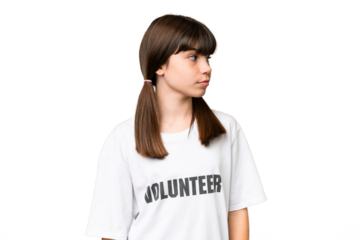 Little volunteer girl over isolated background looking to the side