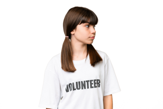 Little volunteer girl over isolated background looking to the side