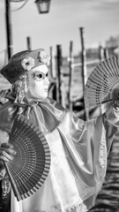 Venice, Italy - February 8th, 2015: People masquerading at the famous Venice Carnival