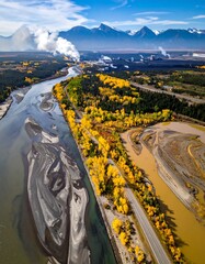 Autumnal river meanders through mountain valley
