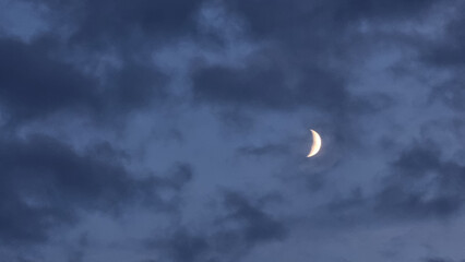 moon nail sky dark clouds