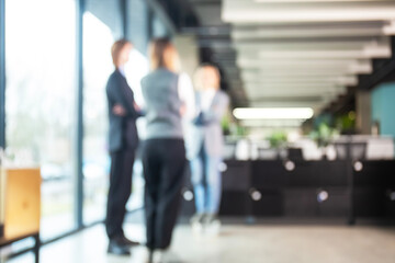 Businessmen blur in the workplace in office with computer or shallow depth of focus of abstract background