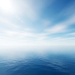 Obraz premium Vast ocean horizon with soft clouds and rippling blue water under a bright sky