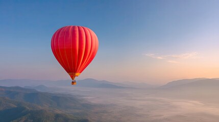 Colorful Hot Air Balloon Soaring Above Misty Mountains at Dawn with Soft Pastel Sky and Serene Landscape
