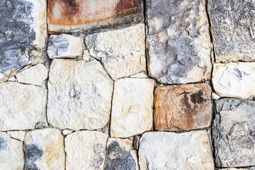 Abstract natural stone texture background in different shapes and colors. Sample laying of a decorative stone wall. layout for design.