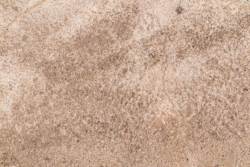 Abstract background of natural surface texture of beige color concrete. Relief pattern of the surface. A copy of the space. sample.