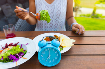 Alarm clock with IF (Intermittent Fasting) 16 and 8 diet rule and weight loss concept.-Diet plan concept