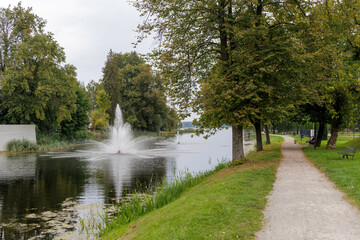 Walking Path by a Canal with a Single Fountain