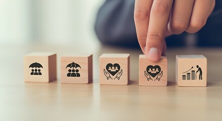 Insurance protection and financial growth concept with hand placing wooden blocks with insurance family icon