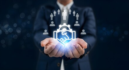 Business person holding digital icon of handshake, gear, and team members for collaboration and success.