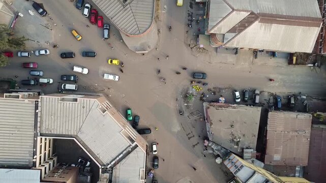 Overhead shot of a busy intersection with cars and buildings in yaound, cameroon
