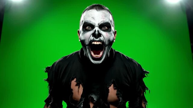 Wrestler with Spooky Face Paint Yelling Against Green Screen
