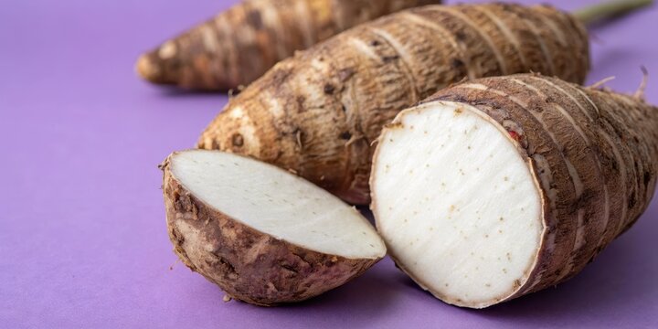 Closeup of taro root vegetable on purple background, taro, root vegetable, eddo malanga, purple, background, closeup, plant