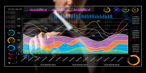 Professional Man Interacting with Futuristic Data Visualization Interface on Black Background with Colorful Graphs and Analytics Reports