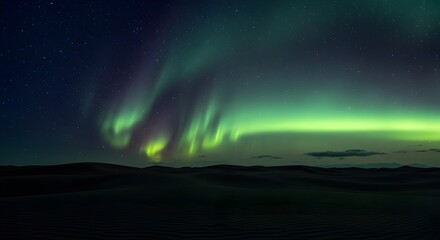 Serene night desert scene featuring vibrant Aurora Borealis streaking across starry navy sky