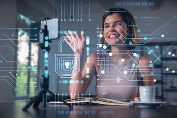 Smiling woman waving at camera during video call with digital lock circuit graphics overlay on secure data communication concept background in office setting.