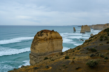 The Twelve Apostles limestone stacks along the Great Ocean Road in Victoria, Australia, a famous coastal landmark known for stunning cliffs, ocean views, and natural beauty.
