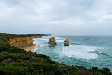 The Twelve Apostles limestone stacks along the Great Ocean Road in Victoria, Australia, a famous coastal landmark known for stunning cliffs, ocean views, and natural beauty.