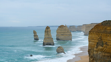 The Twelve Apostles limestone stacks along the Great Ocean Road in Victoria, Australia, a famous coastal landmark known for stunning cliffs, ocean views, and natural beauty.