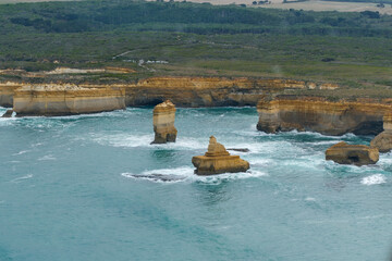 The Twelve Apostles limestone stacks along the Great Ocean Road in Victoria, Australia, a famous coastal landmark known for stunning cliffs, ocean views, and natural beauty.