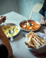 Middle Eastern Breakfast with Shakshuka, Labneh and Fresh Pita Bread*
