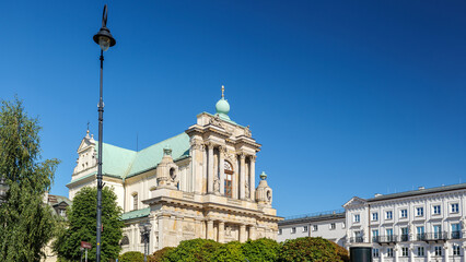 Church of the Assumption of the Blessed Virgin Mary and Saint Joseph in Warsaw on Krakowskie Przedmieście Street. Copy space. Religious architecture. Clear sky