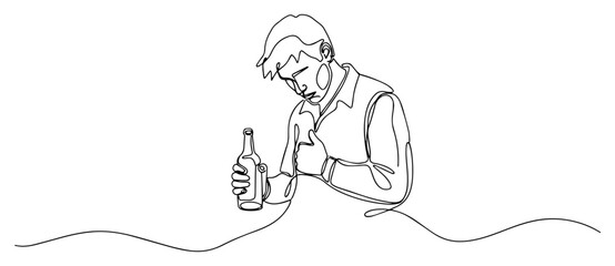 Depressed Man Drinking Alcohol Alone from a Bottle
