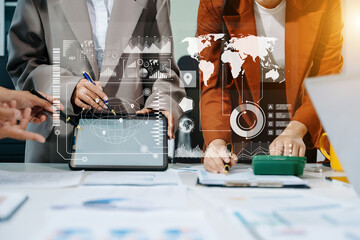 Financial report data of business operations balance sheet and income statement and diagram as Fintech concept.Business team meeting. digital tablet and computer laptop.