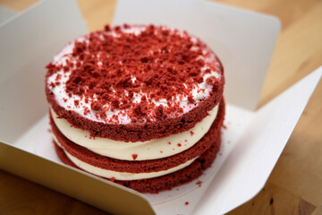 Red velvet cake in small white box