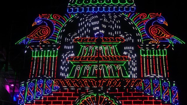 elaborate led light display, likely from a Durga Puja festival in West Bengal
