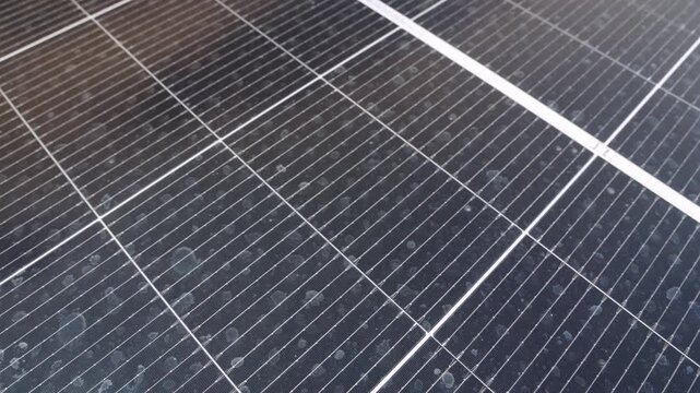 Solar panels are used generate electricity indoor use. They are installed rooftops where dust dried water or animal waste can accumulate reducing their efficiency : Concept for cleaning solar cells.