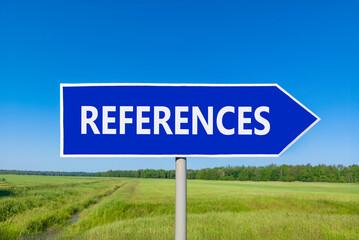 References or reference symbol. Concept word References on beautiful blue road sign. Beautiful blue sky green grass forest peaceful nature background Business references reference concept Copy space